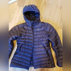 Arcteryx dark purple puffy jacket size large